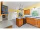 Well-lit kitchen with stainless steel appliances, tile backsplash, and ample cabinet space at 6769 Highway 557 None, Clover, SC 29710