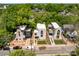 Aerial view of neighborhood showcasing modern homes with unique architectural styles, and manicured lawns at 721 Charles Ave, Charlotte, NC 28205