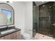 Elegant bathroom features a sleek vanity, modern shower, and natural light at 721 Charles Ave, Charlotte, NC 28205