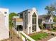 Modern exterior showcasing architectural details, including large windows, and landscaped front yard at 721 Charles Ave, Charlotte, NC 28205