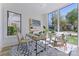 Bright home office space featuring large windows with natural light at 721 Charles Ave, Charlotte, NC 28205