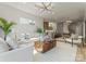 Open living room and kitchen design with hardwood floors and modern lighting at 721 Charles Ave, Charlotte, NC 28205
