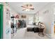 Fun bedroom with vintage gas pump and automotive decor and television at 7239 Oxford Hunt Dr, Stanley, NC 28164