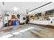 Well organized garage featuring tons of storage space at 7239 Oxford Hunt Dr, Stanley, NC 28164