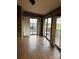 Wood-floored room with sliding doors leading to a deck at 7527 Old Shelby Rd, Vale, NC 28168