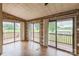 Bright room with sliding glass doors leading to a deck and backyard at 7527 Old Shelby Rd, Vale, NC 28168