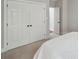 Bedroom featuring a plush carpet and a large closet space to organize your wardrobe at 7626 Vistaview Dr, Cornelius, NC 28031