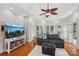 Comfortable living area with hardwood floors, large windows, and stylish decor at 7626 Vistaview Dr, Cornelius, NC 28031