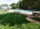 Large community pool with ample seating and well-maintained landscaping at 7626 Vistaview Dr, Cornelius, NC 28031