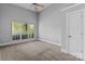 Bedroom featuring neutral paint, carpet, a ceiling fan, and a bright window at 7748 Long Bay Pkwy, Catawba, NC 28609