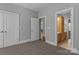 Bedroom with doorways leading to bathroom and other rooms at 7748 Long Bay Pkwy, Catawba, NC 28609