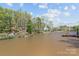 Scenic lake view with a pier and docks in the background at 7748 Long Bay Pkwy, Catawba, NC 28609