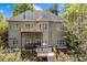 Beautiful rear exterior with a deck and a hot tub, perfect for outdoor relaxation and entertaining at 7748 Long Bay Pkwy, Catawba, NC 28609