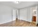 This bedroom offers ample closet space, hardwood floors and neutral paint. Adjacent to the bathroom at 801 Bilmark Ave, Charlotte, NC 28213