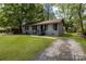Charming home with a well-manicured lawn and a welcoming front entrance at 801 Bilmark Ave, Charlotte, NC 28213