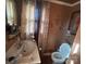 Cozy bathroom featuring a sink, toilet, and stylish wall decorations at 829 Green St, Salisbury, NC 28144