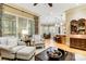 Comfortable living area with natural light, neutral tones, and seamless flow into the dining area and kitchen at 9200 Kingsmead Ln, Waxhaw, NC 28173