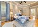 Comfortable main bedroom with a tray ceiling, soft lighting, and stylish decor for restful nights at 9200 Kingsmead Ln, Waxhaw, NC 28173