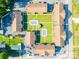 A captivating aerial view showcasing the layout of the apartment complex, featuring a communal pool and ample parking spaces at 103 Carriage House Dr, Kannapolis, NC 28081