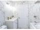 Elegant bathroom with marble-look tiles, modern vanity, and bathtub at 103 Carriage House Dr, Kannapolis, NC 28081