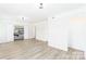Spacious bedroom with open closet and wood-style laminate floors at 103 Carriage House Dr, Kannapolis, NC 28081