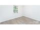 Cozy bedroom with hardwood floors and natural light at 103 Carriage House Dr, Kannapolis, NC 28081