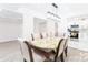 Light-filled dining room featuring a modern chandelier and hardwood floors at 103 Carriage House Dr, Kannapolis, NC 28081