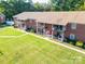 Charming exterior view of apartments with cozy balconies, showcasing well-maintained grounds and a welcoming community atmosphere at 103 Carriage House Dr, Kannapolis, NC 28081