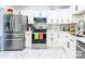 Well-appointed kitchen featuring stainless steel appliances and white cabinetry at 103 Carriage House Dr, Kannapolis, NC 28081