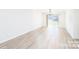 Bright, open living room with sliding glass door and hardwood floors at 103 Carriage House Dr, Kannapolis, NC 28081