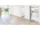 Bright, open living room with sliding glass door and chandelier at 103 Carriage House Dr, Kannapolis, NC 28081