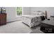 Comfortable bedroom with natural light, neutral colors, and ample space at 10340 Williams Rd, Mint Hill, NC 28227