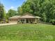 Charming home with well-maintained lawn, landscaping, and a two-car garage at 10340 Williams Rd, Mint Hill, NC 28227