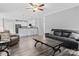 Inviting living room flows to kitchen, featuring stylish floors and a cozy seating area with natural light at 10340 Williams Rd, Mint Hill, NC 28227