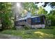 Charming home featuring a stone foundation and wooden siding, nestled in a lush, green environment at 1042 Jackson Rd, Fort Lawn, SC 29714