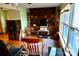 Cozy living room features hardwood floors, built-in shelving, and natural light from the windows at 1042 Jackson Rd, Fort Lawn, SC 29714