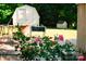Relaxing backyard patio featuring outdoor furniture and picturesque views of a cottage-style shed at 106 Friendfield Dr # B, Fort Mill, SC 29715