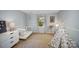 Bedroom with light blue walls, white trim, modern furniture, and a teepee in a well-lit space at 106 Friendfield Dr # B, Fort Mill, SC 29715