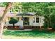 Beautiful home with a manicured lawn, mature trees, and a welcoming front porch at 106 Friendfield Dr # B, Fort Mill, SC 29715
