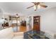 Spacious living room with hardwood floors, a cozy seating area, and natural light at 106 Friendfield Dr # B, Fort Mill, SC 29715