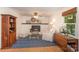 Comfortable living room with hardwood floors, a fireplace, and a cozy seating area at 106 Friendfield Dr # B, Fort Mill, SC 29715