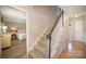 Inviting stairway leading upstairs, with a view into the bedroom and durable flooring at 106 Friendfield Dr # B, Fort Mill, SC 29715