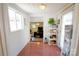 Hallway leading to a living room with a shelf and decor, showcasing the home's layout at 1081 Deas St, Rock Hill, SC 29732