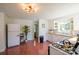 Spacious kitchen featuring white appliances, butcher block countertops, and retro pink tile flooring at 1081 Deas St, Rock Hill, SC 29732