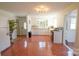 Bright kitchen with white cabinetry, updated appliances, and original tile floors at 1081 Deas St, Rock Hill, SC 29732