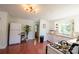 Spacious kitchen featuring white appliances, butcher block countertops, and retro pink tile flooring at 1081 Deas St, Rock Hill, SC 29732