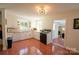 Charming kitchen with ample counter space, white cabinets, and retro tile flooring at 1081 Deas St, Rock Hill, SC 29732