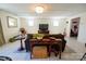 Cozy living room featuring neutral paint, tile floors, and a decorative console table at 1081 Deas St, Rock Hill, SC 29732