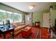 Spacious living room with hardwood floors, a fireplace, and plenty of natural light at 1081 Deas St, Rock Hill, SC 29732