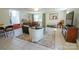 Comfortable living room with sofa, chair, tv, and tile floors, with natural light from a window at 1081 Deas St, Rock Hill, SC 29732